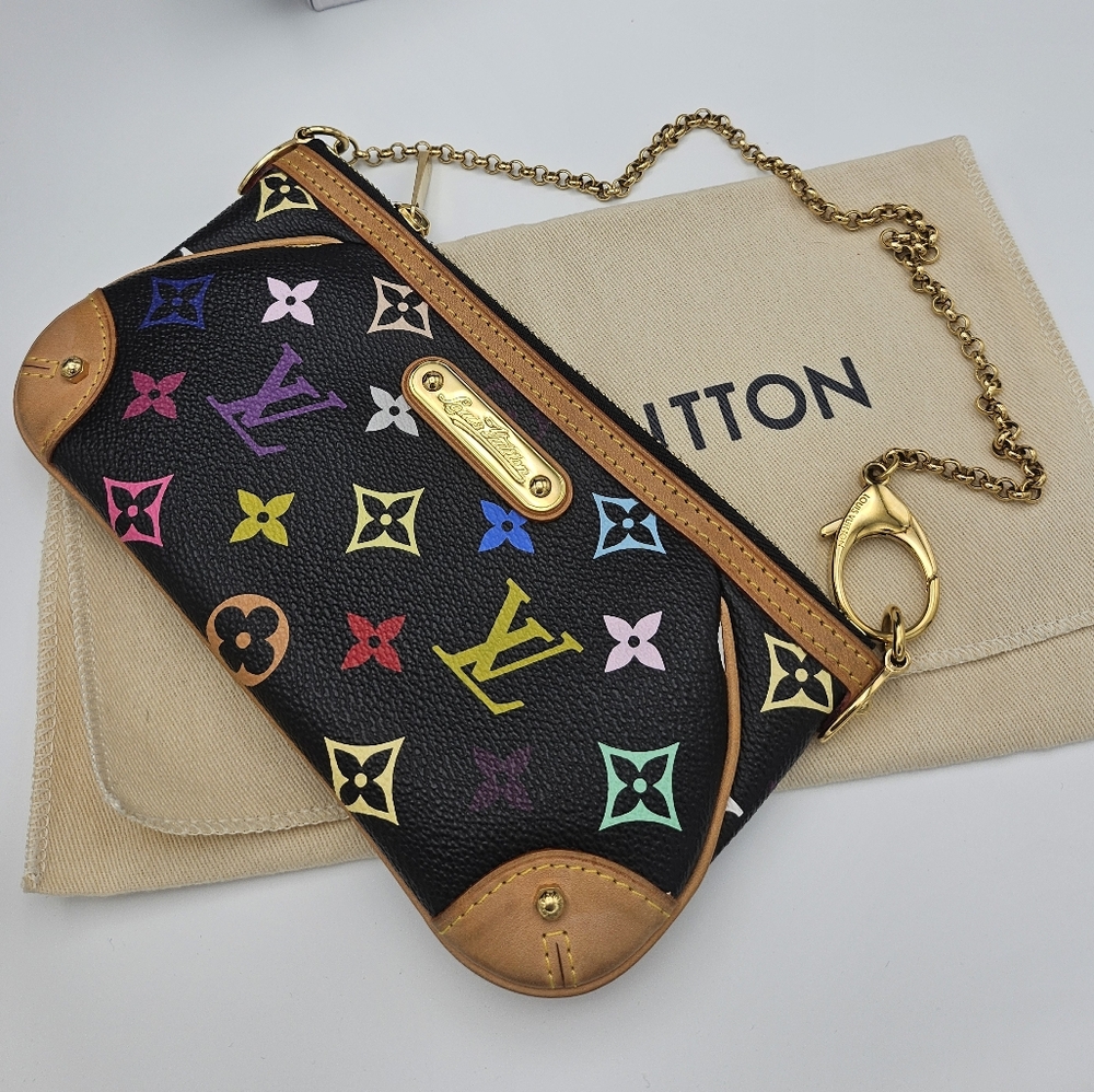 Authentic Louis Vuitton Milla MM multicolor in Excellent preowned condition